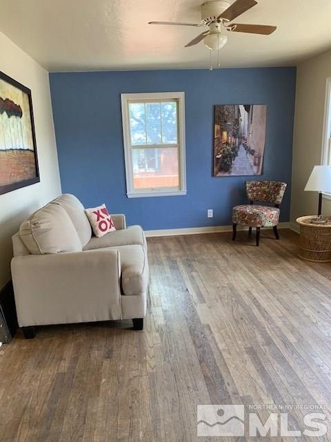 435 West Taylor Street Reno, NV 89509 - Photo 2 of 15 a living room with furniture and a wooden floor
