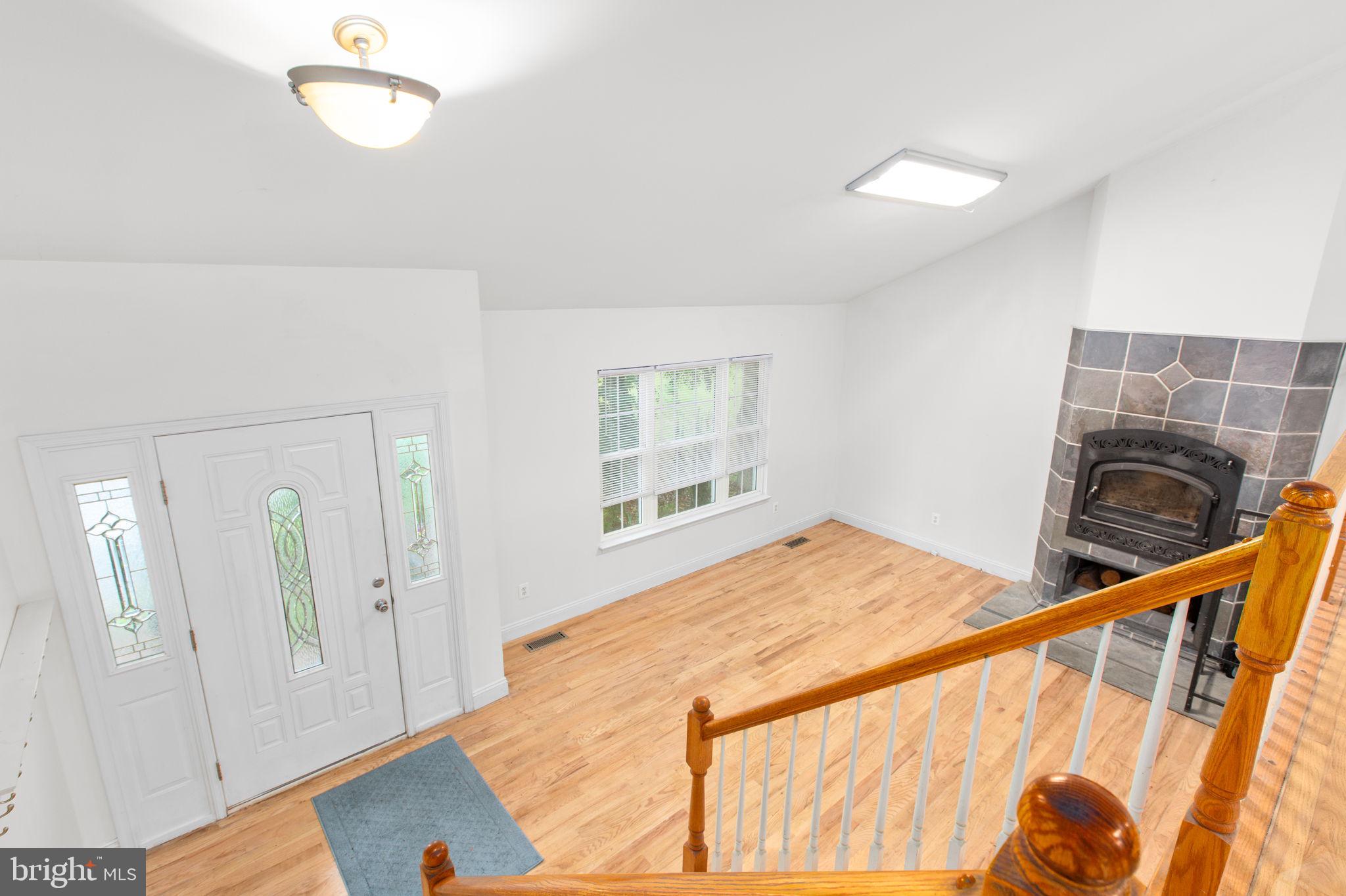 53 Bloomington Lane Stafford, VA 22554 - Photo 15 of 60 a bedroom with a bed and a window