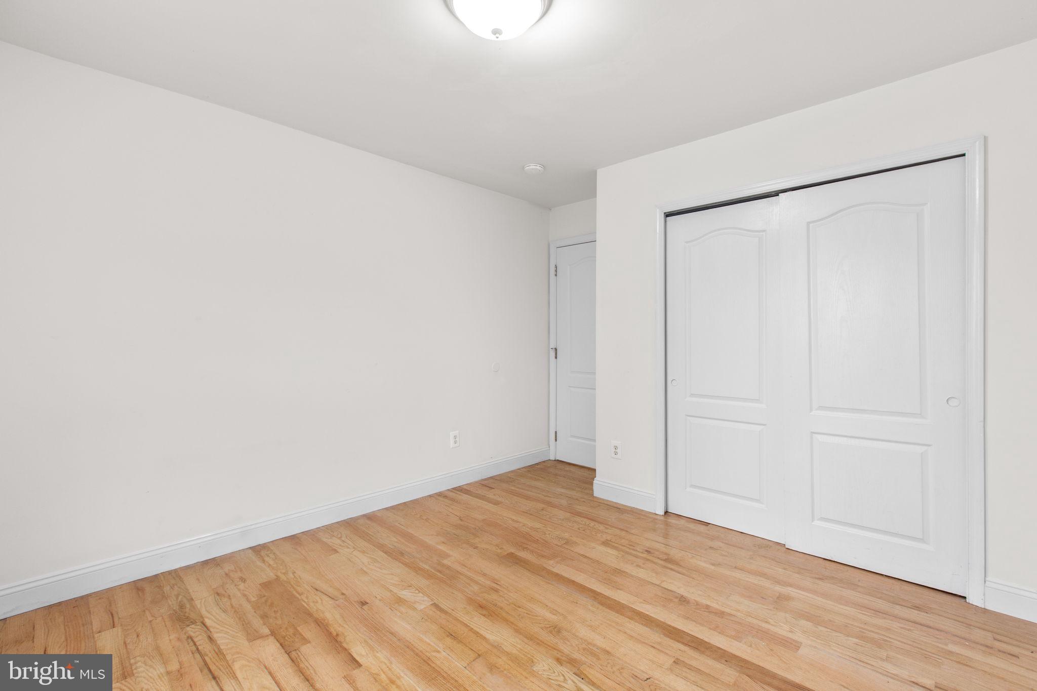 53 Bloomington Lane Stafford, VA 22554 - Photo 17 of 60 a view of empty room with wooden floor