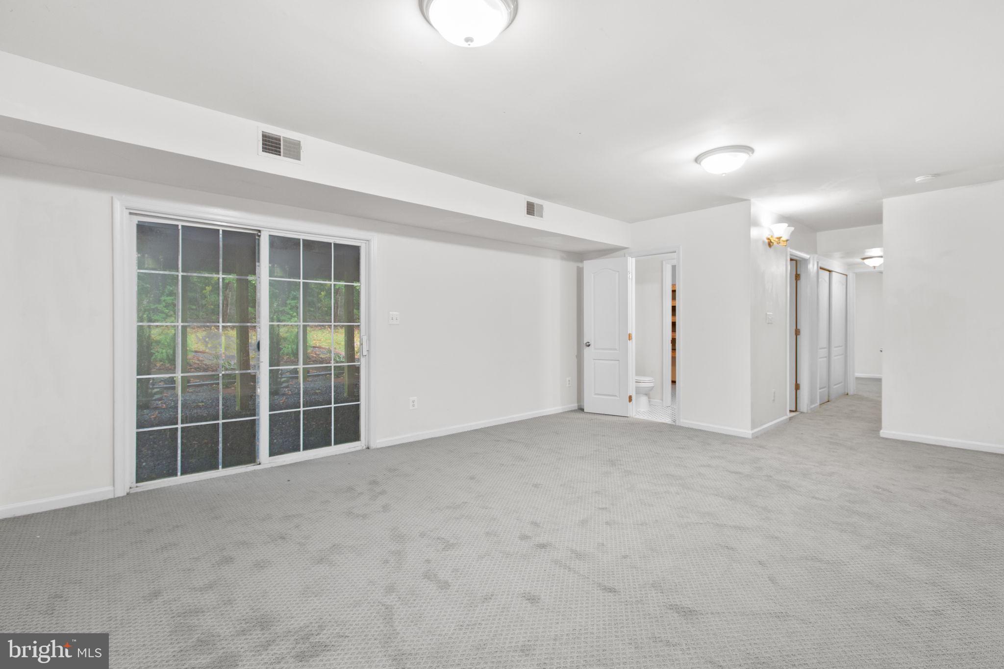 53 Bloomington Lane Stafford, VA 22554 - Photo 36 of 60 a view of an empty room with a window