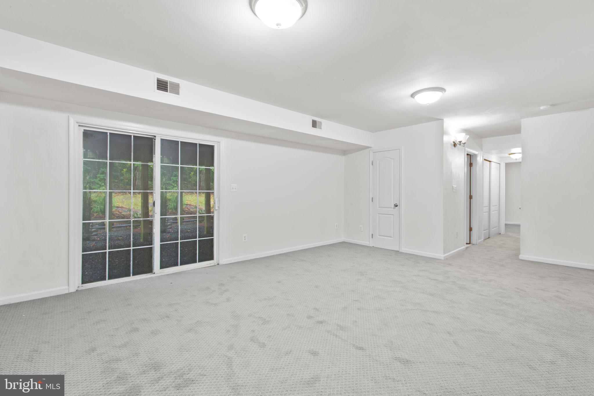 53 Bloomington Lane Stafford, VA 22554 - Photo 37 of 60 a view of an empty room with a window