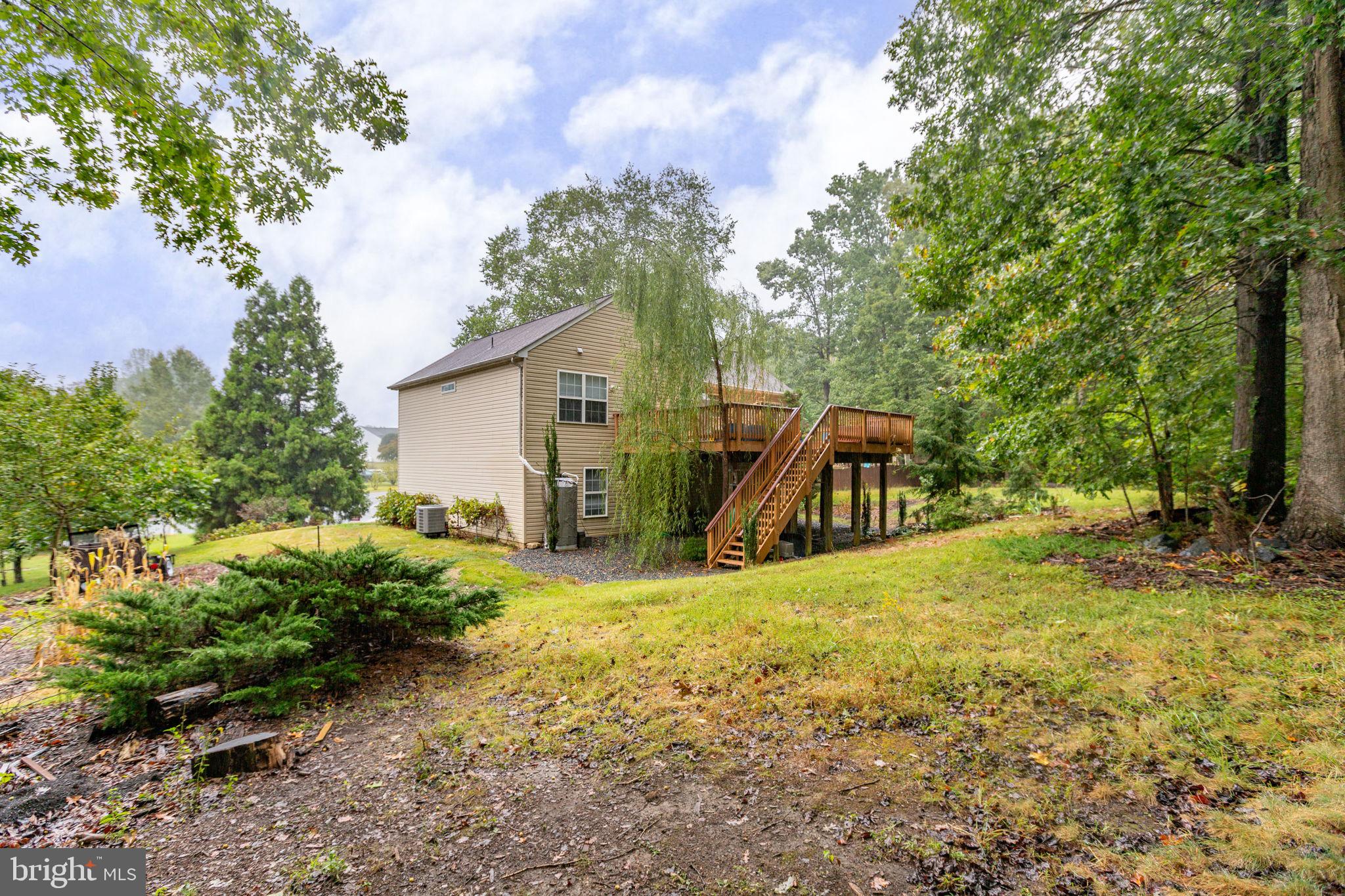53 Bloomington Lane Stafford, VA 22554 - Photo 47 of 60 a view of a backyard with large trees