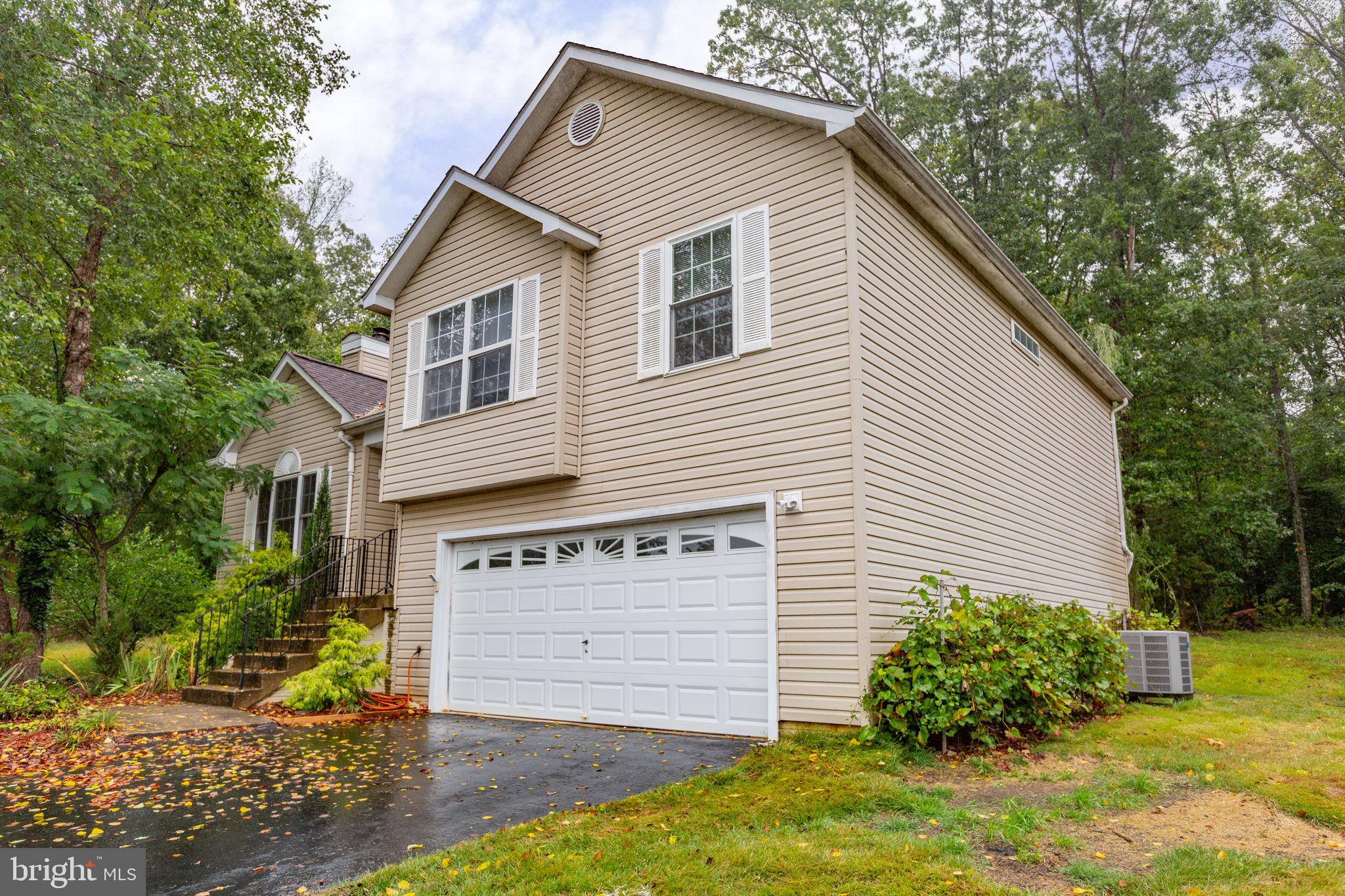 53 Bloomington Lane Stafford, VA 22554 - Photo 54 of 60 a view of a house with yard and plants