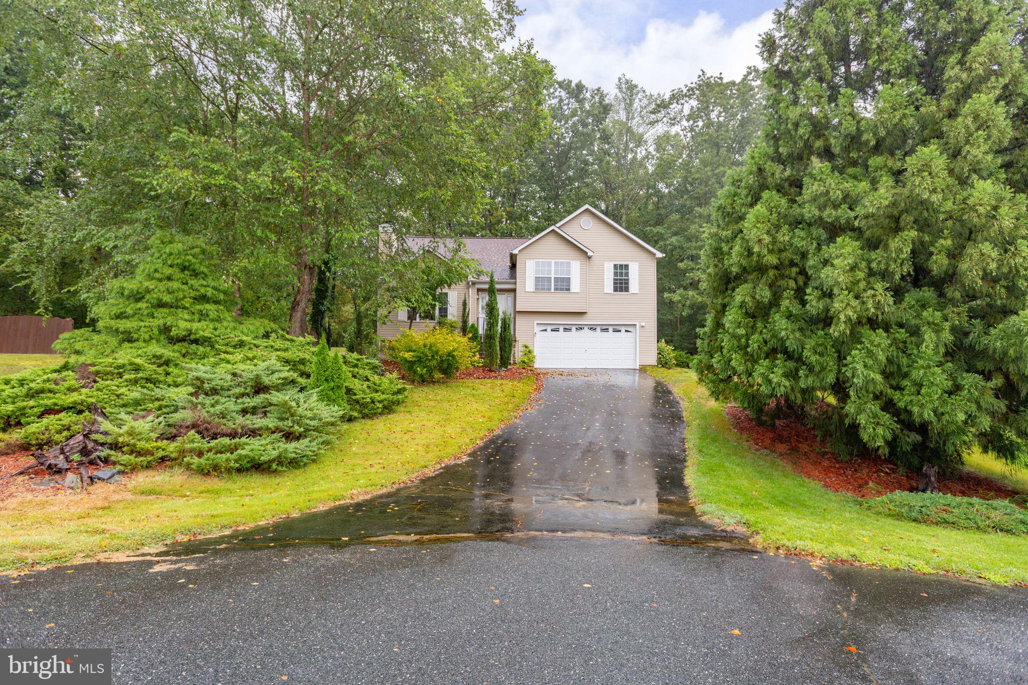 53 Bloomington Lane Stafford, VA 22554 - Photo 58 of 60 a house with huge green field in front of it