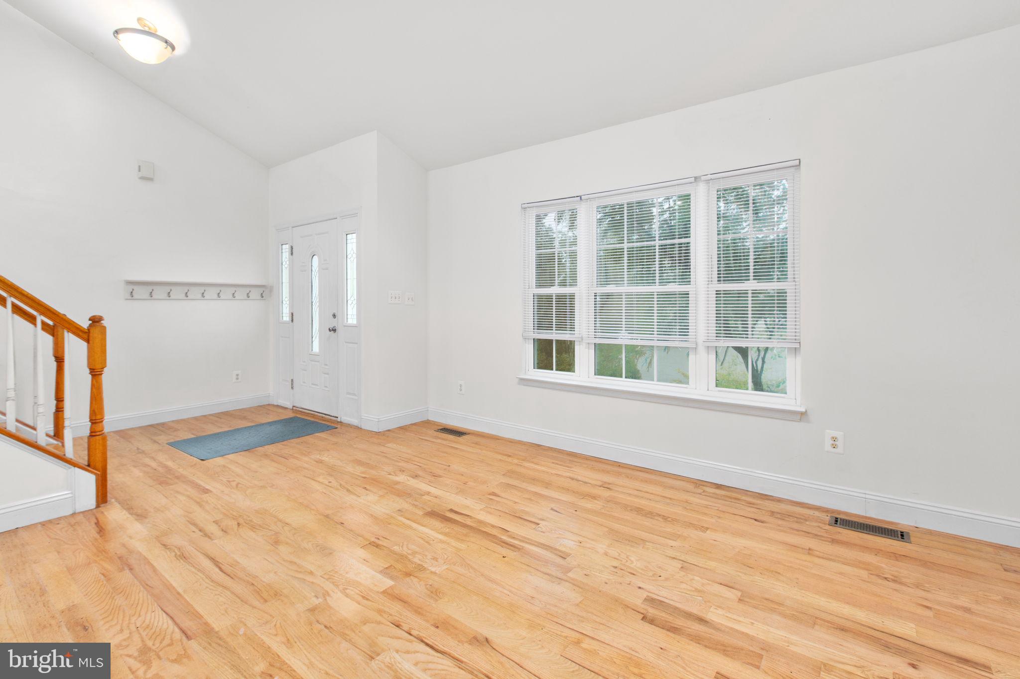 53 Bloomington Lane Stafford, VA 22554 - Photo 6 of 60 a view of an empty room with a window