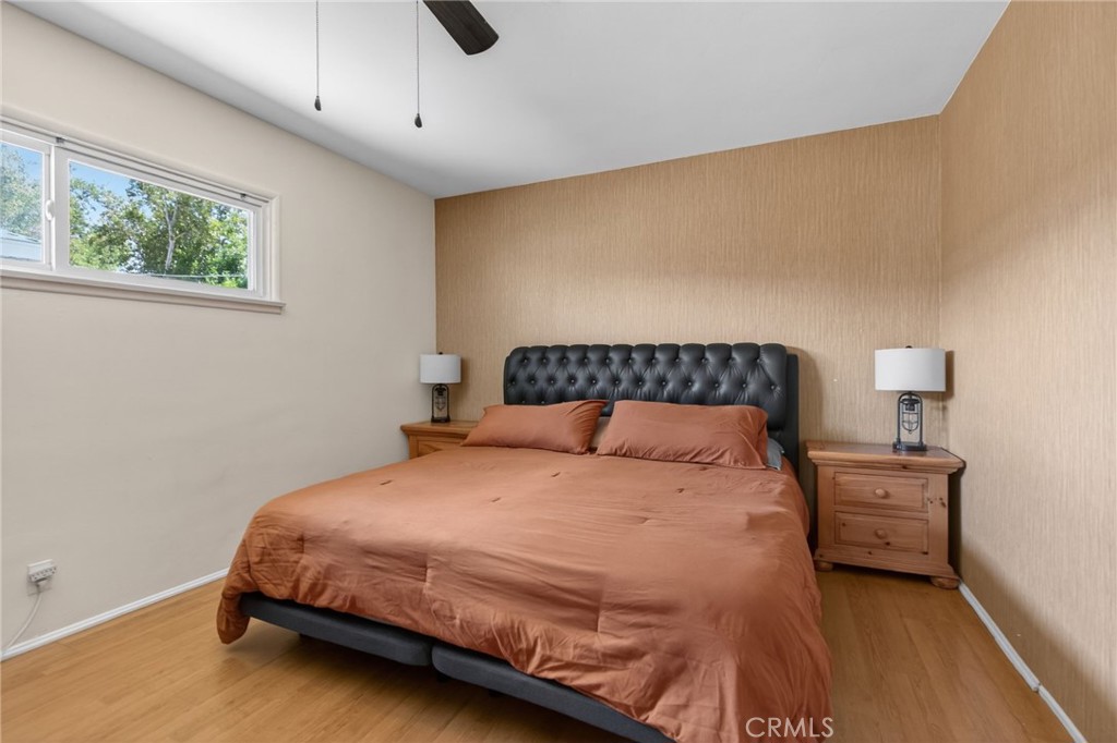 4194 Euclid Court Riverside, CA 92504 - Photo 15 of 29 Primary bedroom with ceiling fan and sense of privacy and quiet.