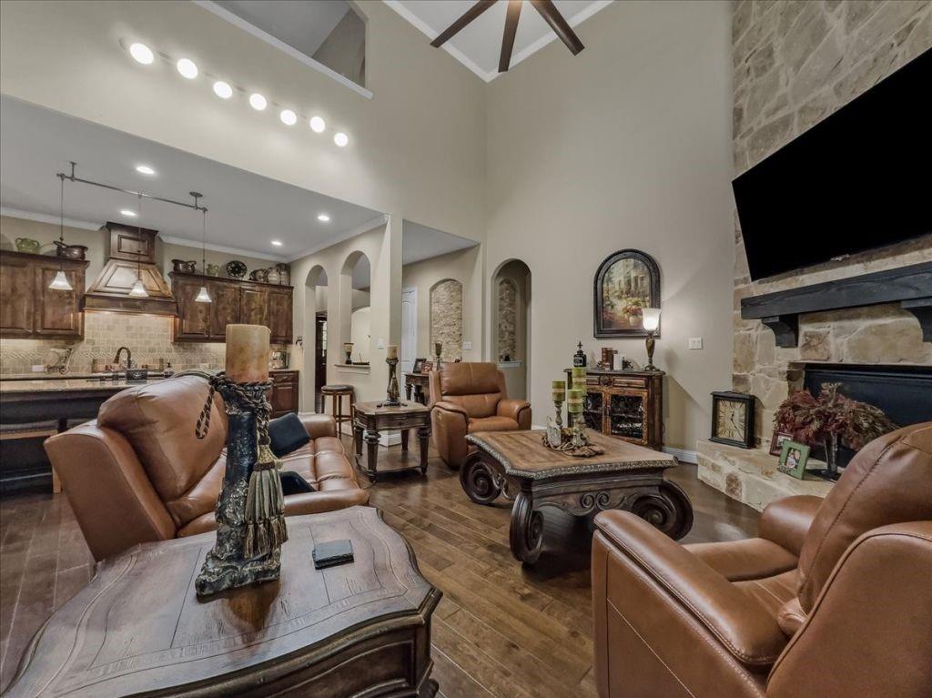 2832 Mona Vale Road Trophy Club, TX 76262 - Photo 5 of 37 a living room with furniture and a flat screen tv