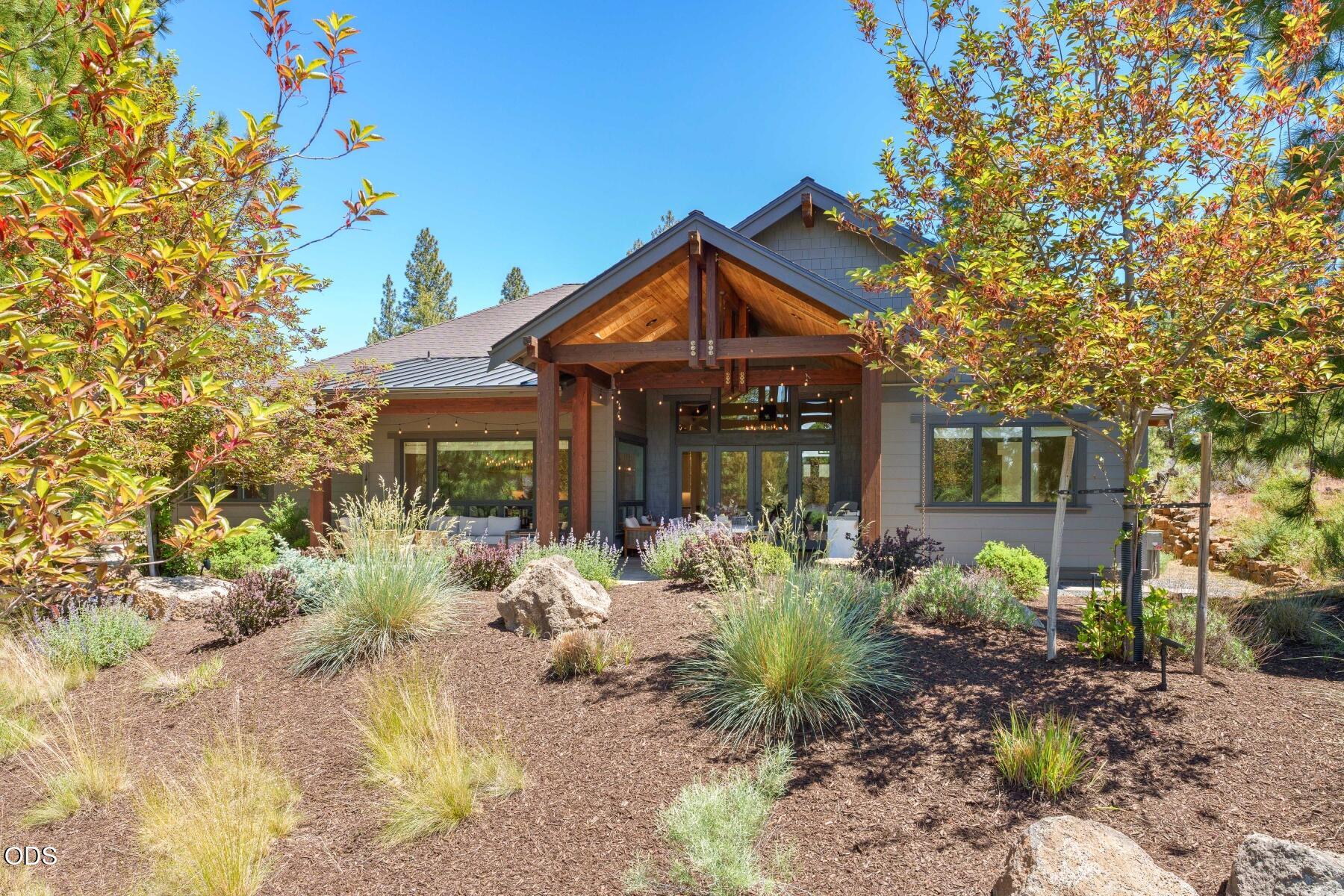 60255 Sunset View Drive Bend, OR 97702 - Photo 42 of 48 a front view of a house with garden