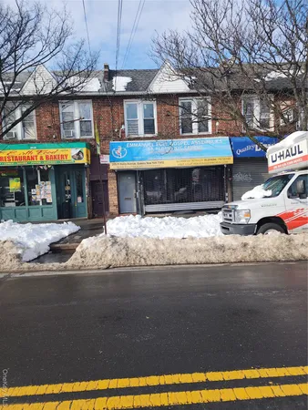 a view of a building with a yard