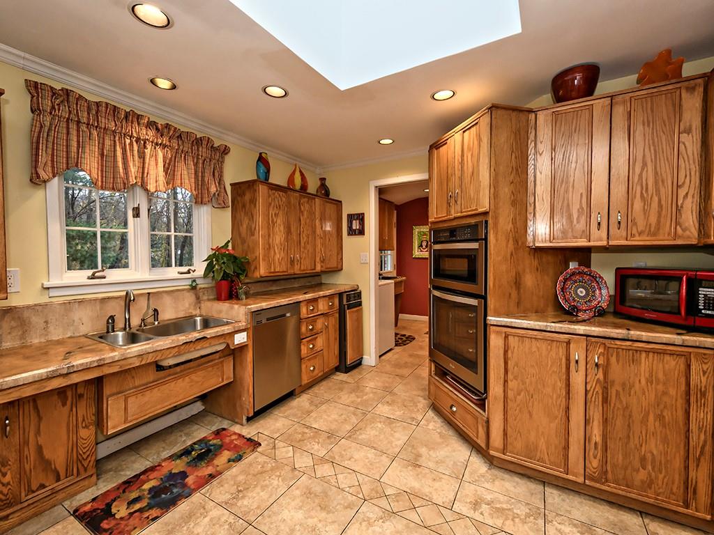 936 Field Club Road Pittsburgh, PA 15238 - Photo 12 of 25 Cool concrete counter tops and built in appliances.