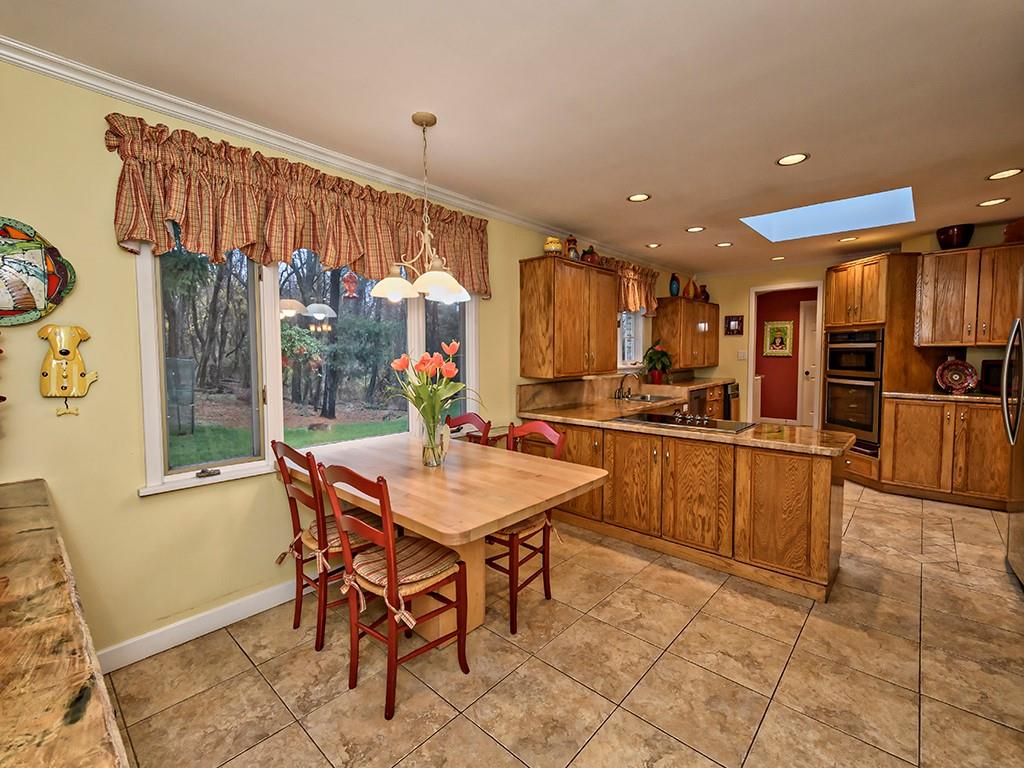 936 Field Club Road Pittsburgh, PA 15238 - Photo 9 of 25 Expansive Kitchen with plenty of storage and natural light.