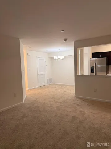 a view of a room with an empty space