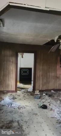 a bathroom with a toilet a sink and a window