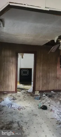 a bathroom with a toilet a sink and a window