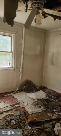 a view of house with yard