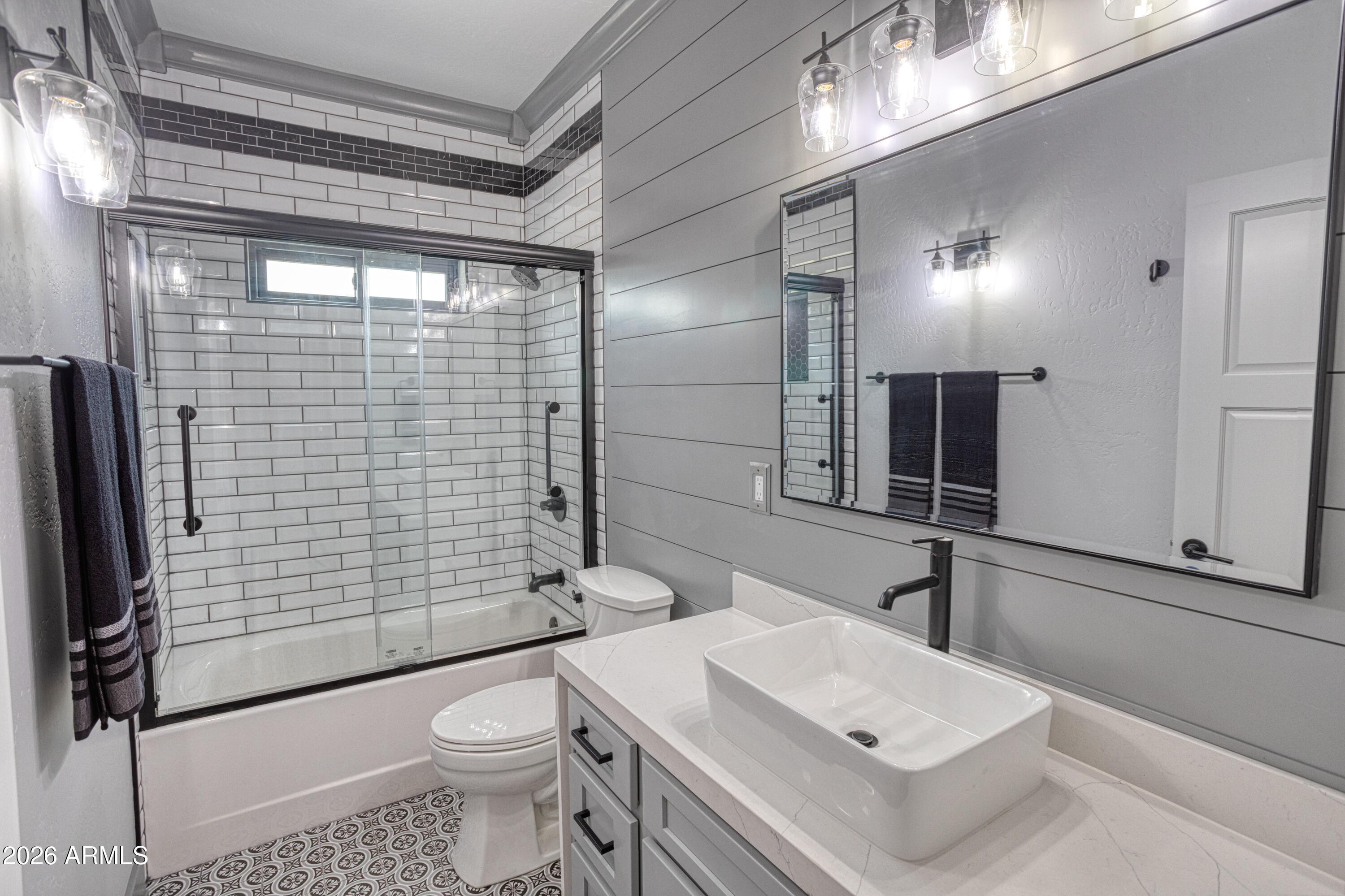 2281 West Edgewater Show Low, AZ 85901 - Photo 32 of 46 a bathroom with a sink toilet and shower