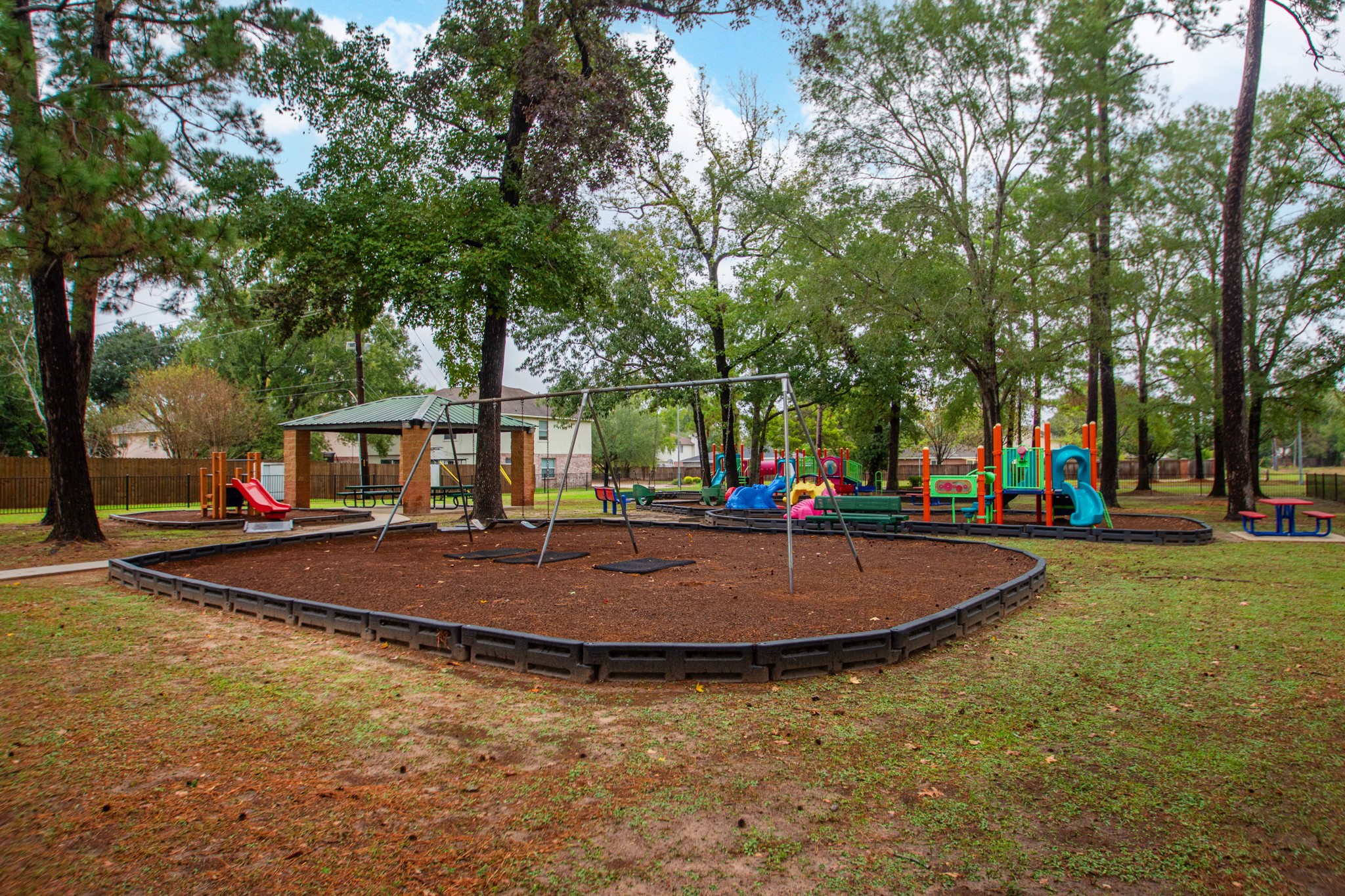 29019 Stapleford Street Spring, TX 77386 - Photo 26 of 27 a building view with swimming pool and trees in the background