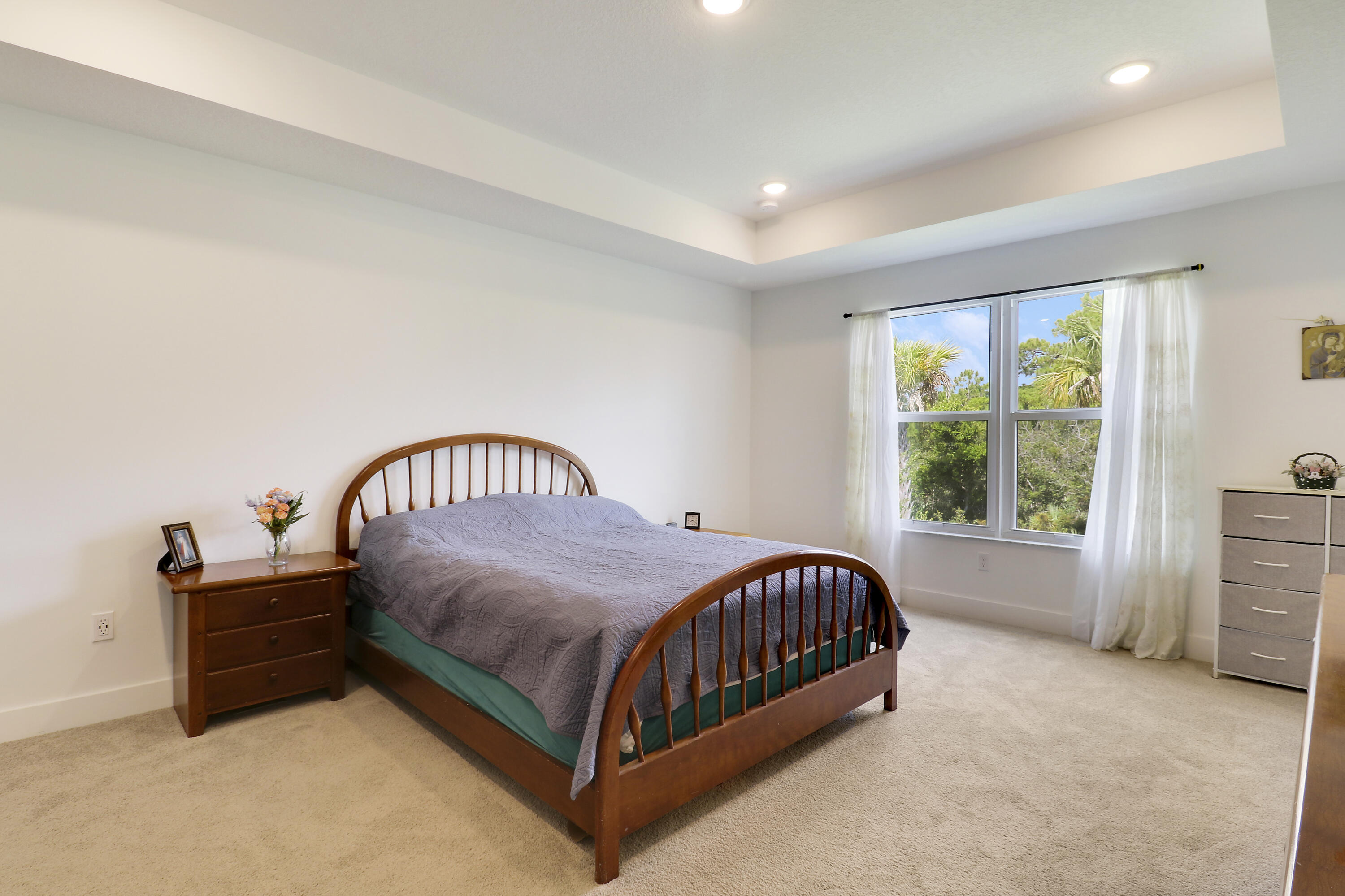 1416 Gopher Terrace Stuart, FL 34994 - Photo 17 of 53 a bedroom with a bed and a window