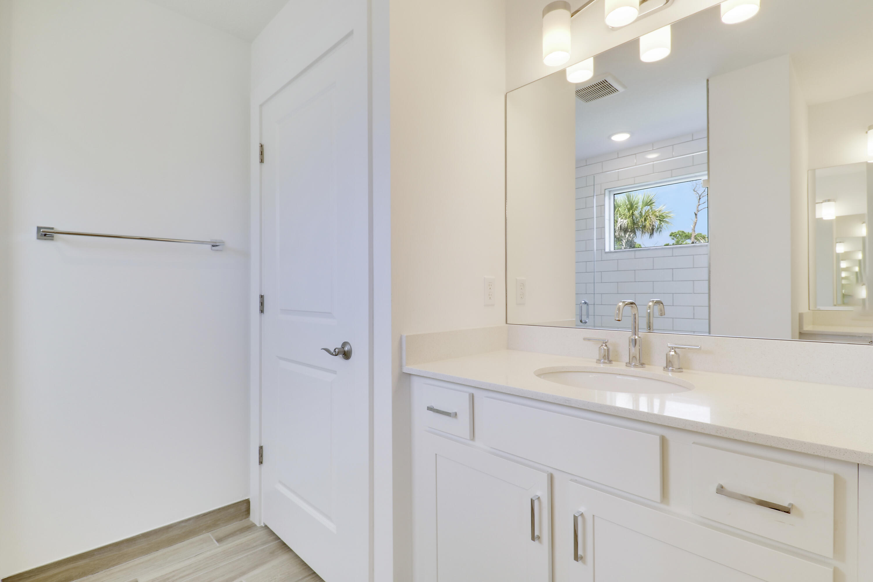 1416 Gopher Terrace Stuart, FL 34994 - Photo 19 of 53 a bathroom with a sink and a mirror