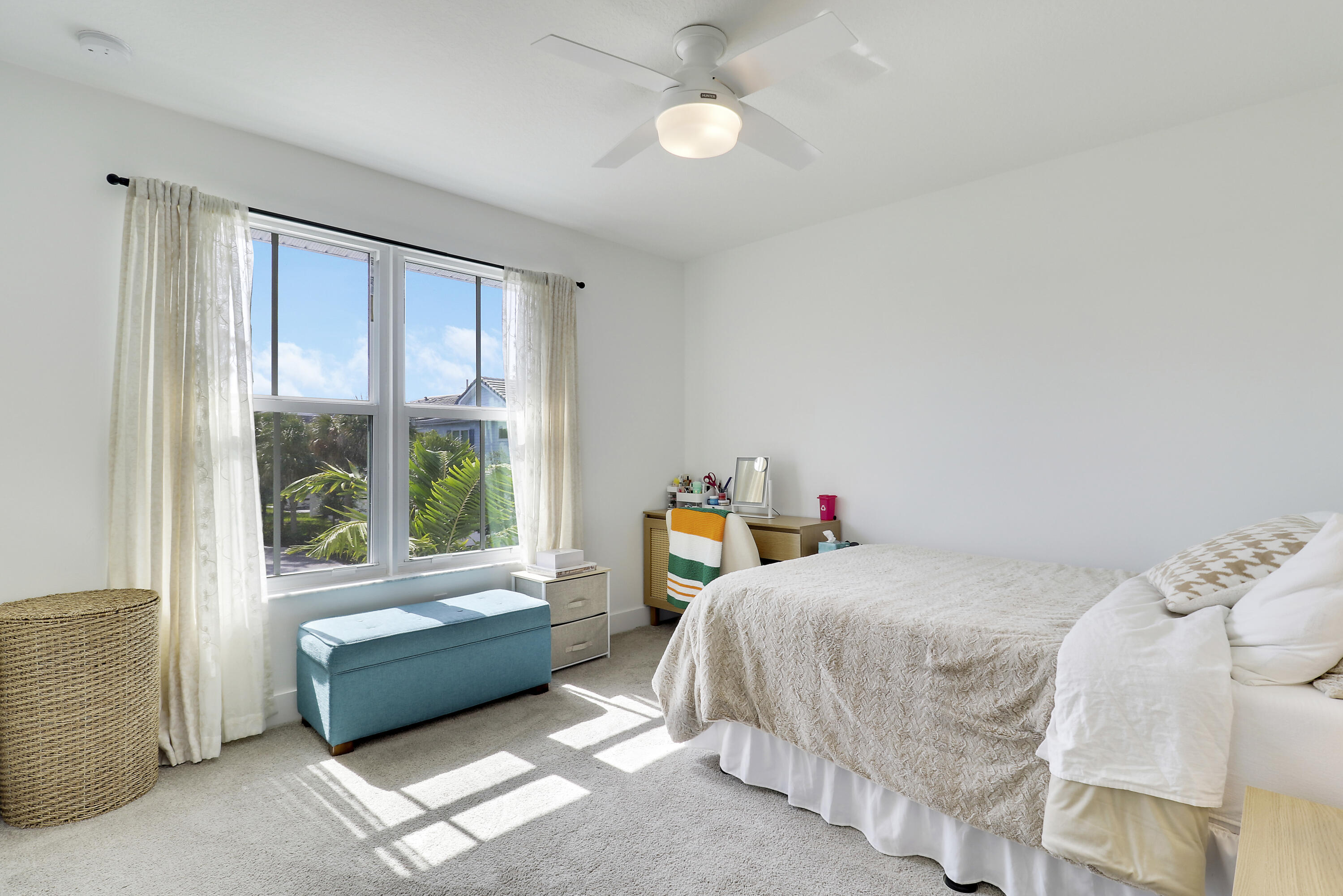 1416 Gopher Terrace Stuart, FL 34994 - Photo 23 of 53 a bedroom with a bed and a large window