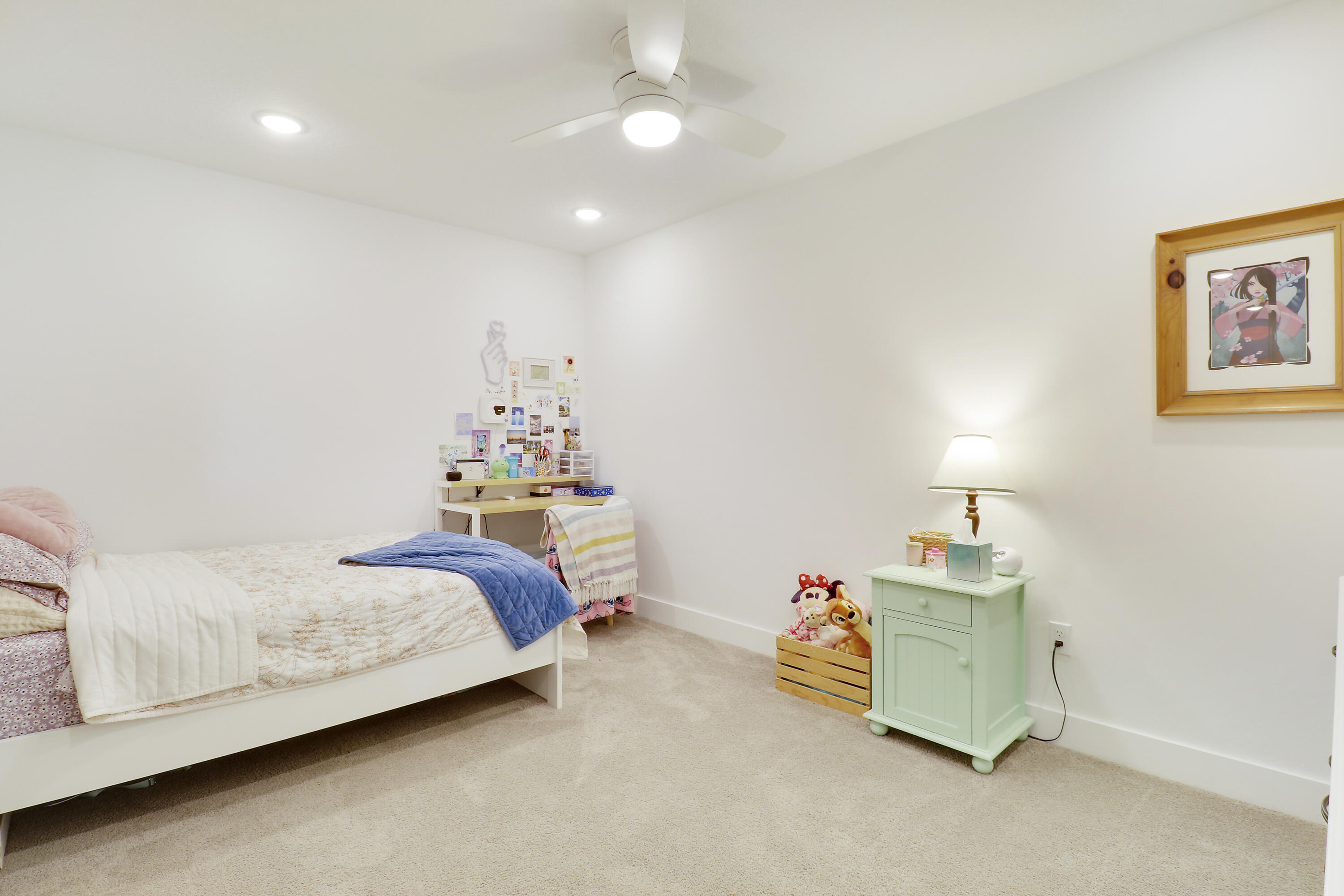 1416 Gopher Terrace Stuart, FL 34994 - Photo 25 of 53 a bedroom with a bed and a lamp