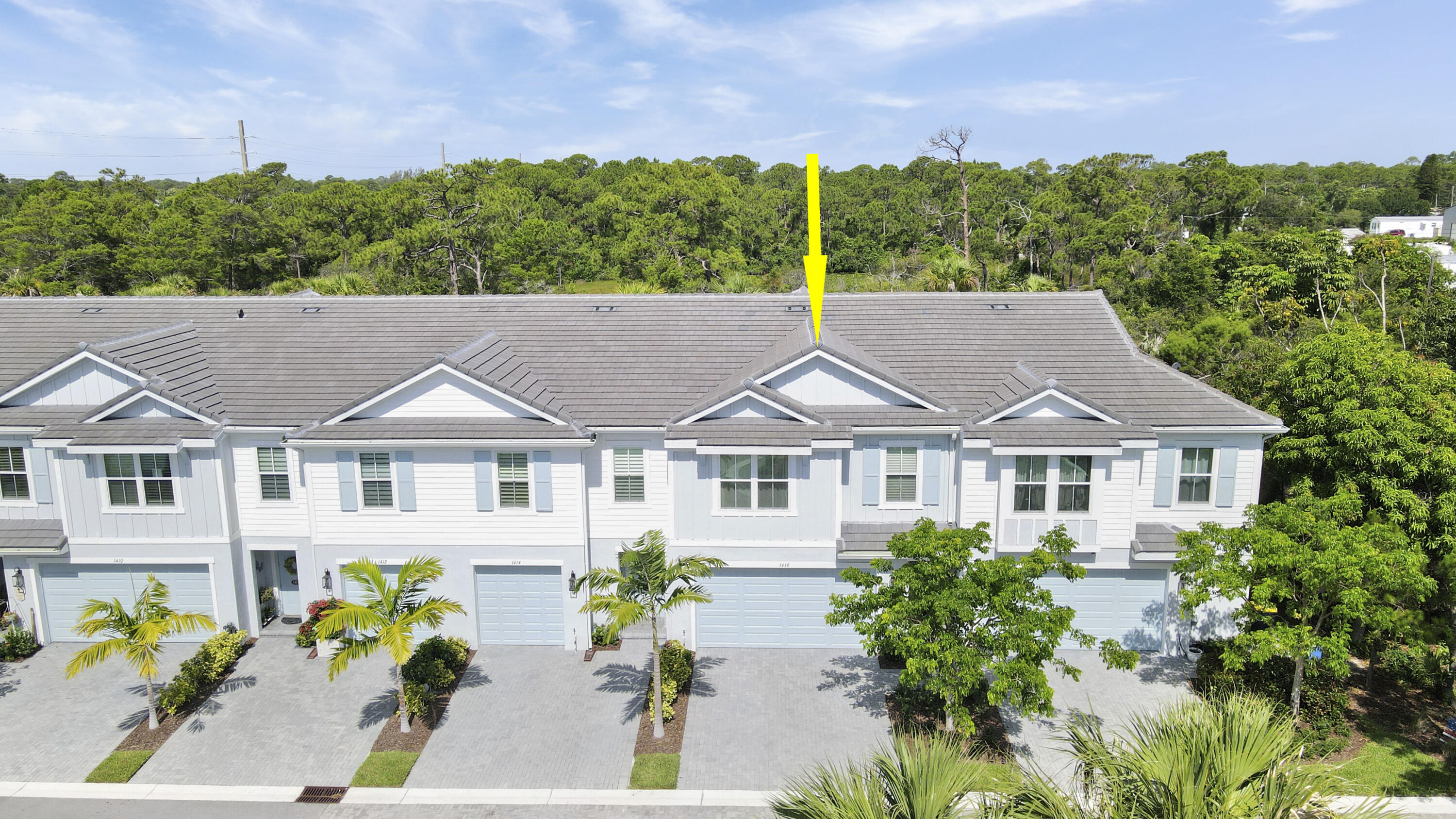 1416 Gopher Terrace Stuart, FL 34994 - Photo 34 of 53 a house with trees in the background