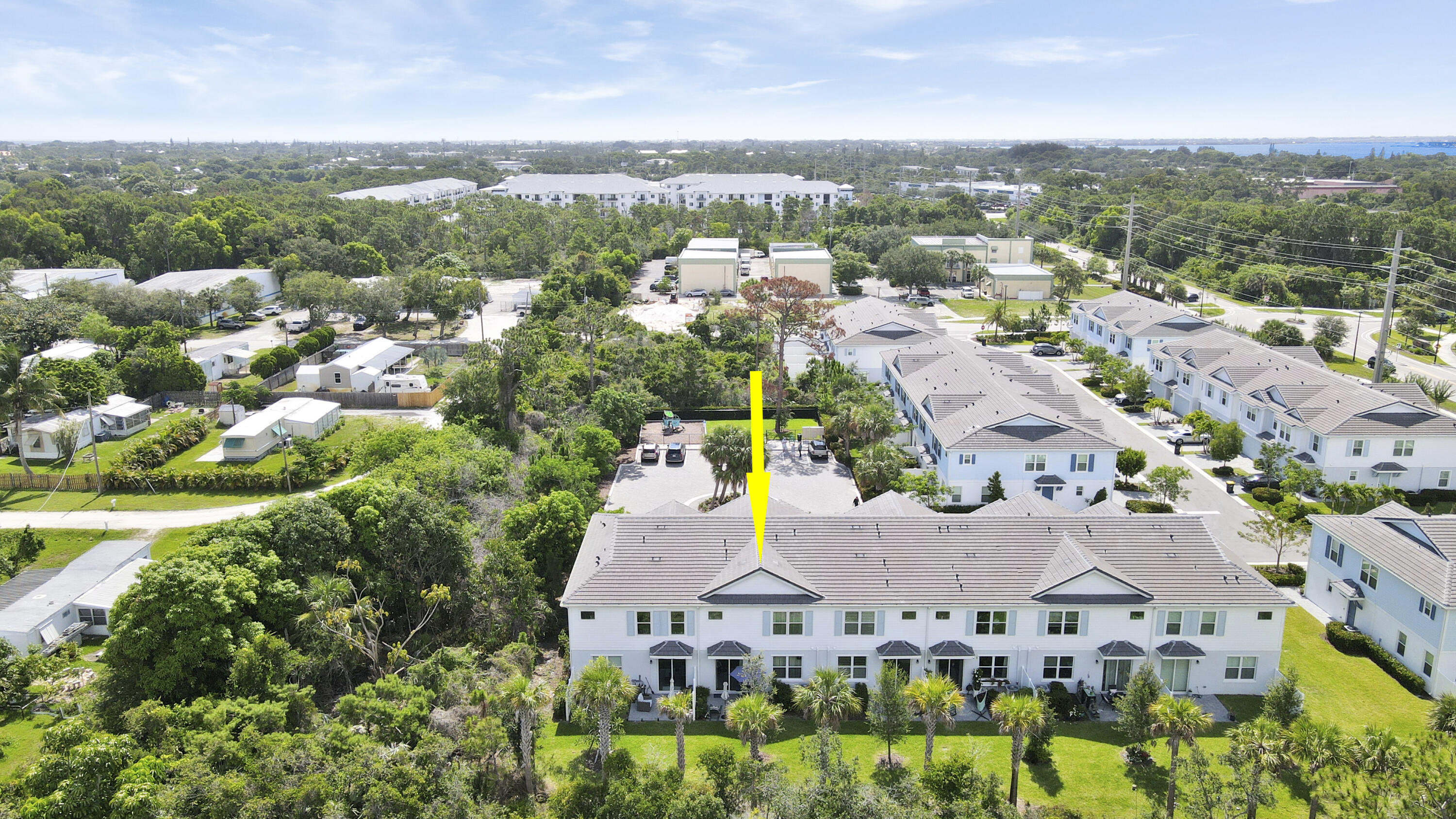 1416 Gopher Terrace Stuart, FL 34994 - Photo 50 of 53 an aerial view of residential houses with outdoor space and trees