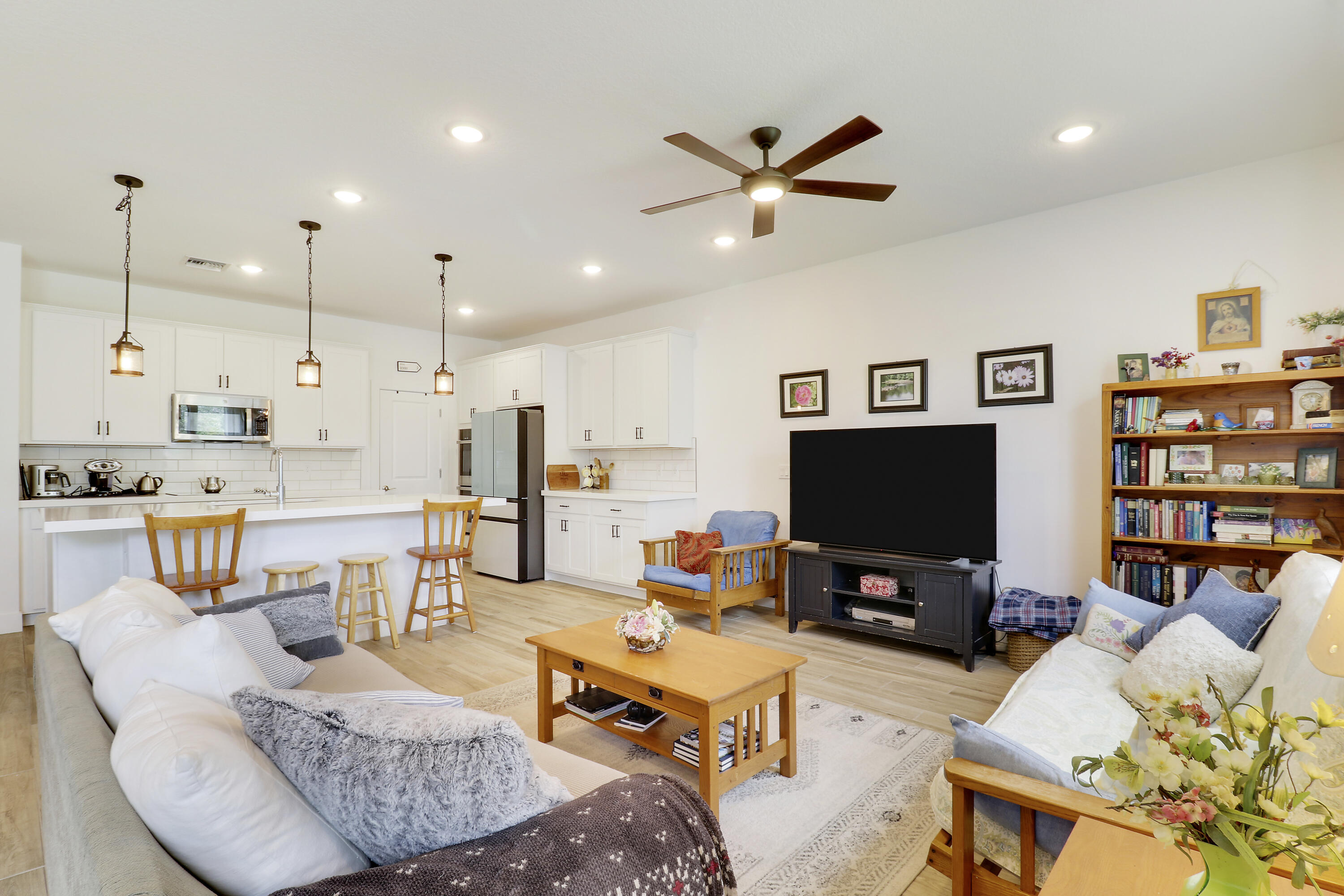 1416 Gopher Terrace Stuart, FL 34994 - Photo 10 of 53 a living room with furniture and a flat screen tv