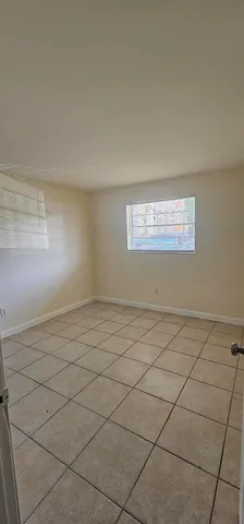 a view of a room and window