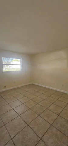 a view of a room and window