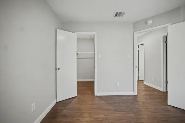 a view of an empty walk in closet
