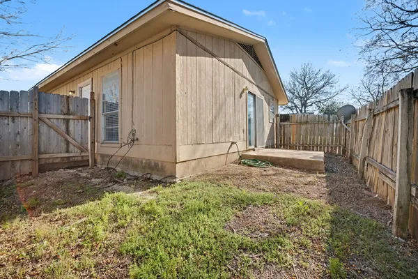 a car parked in front of a house