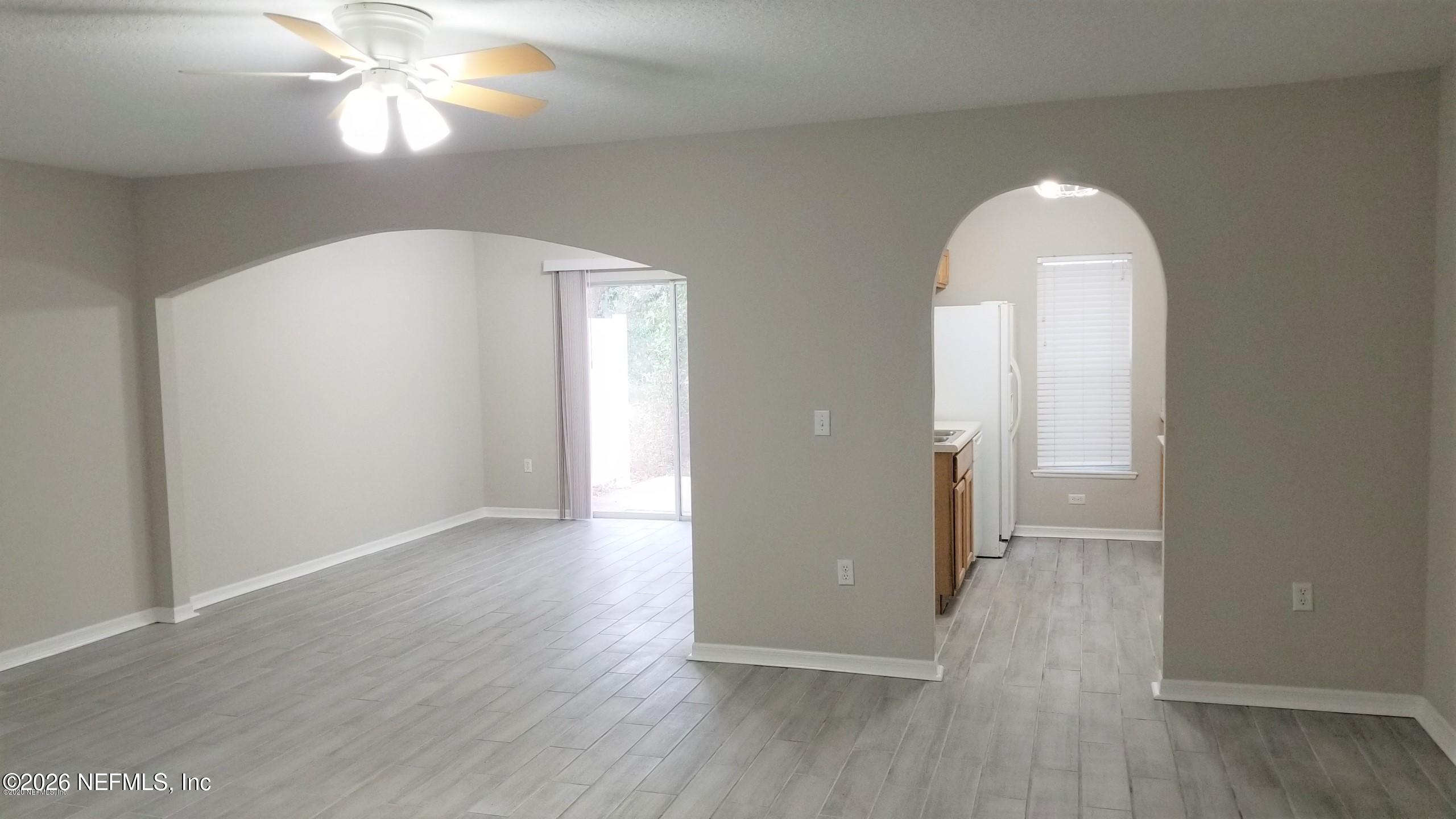 10462 Autumn Trace Road Jacksonville, FL 32257 - Photo 4 of 7 a view of empty room with wooden floor