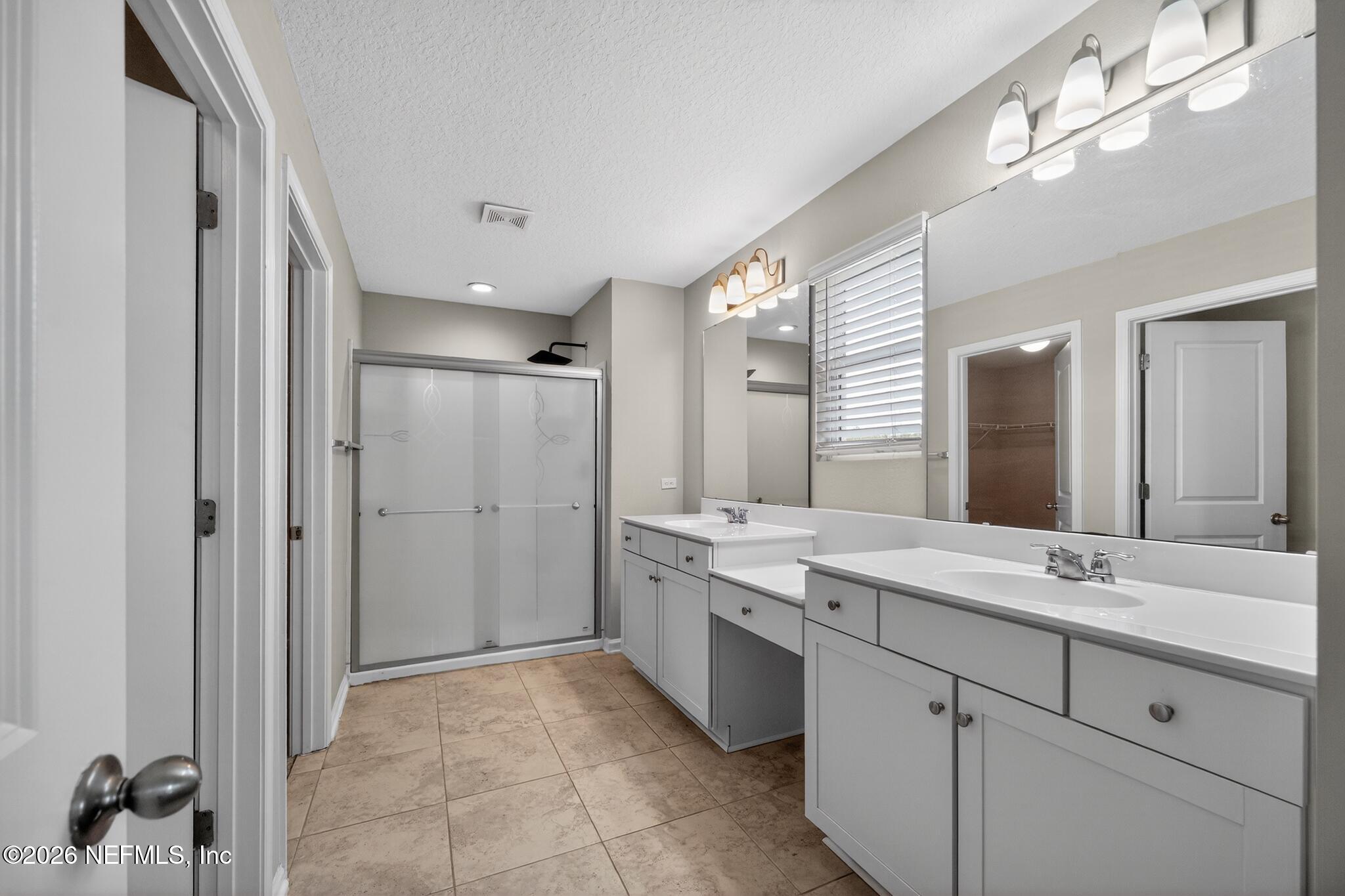 4818 Morning Rise Circle Jacksonville, FL 32218 - Photo 24 of 33 23_4818_Morning_Rise_Cir-Bathroom-8486
