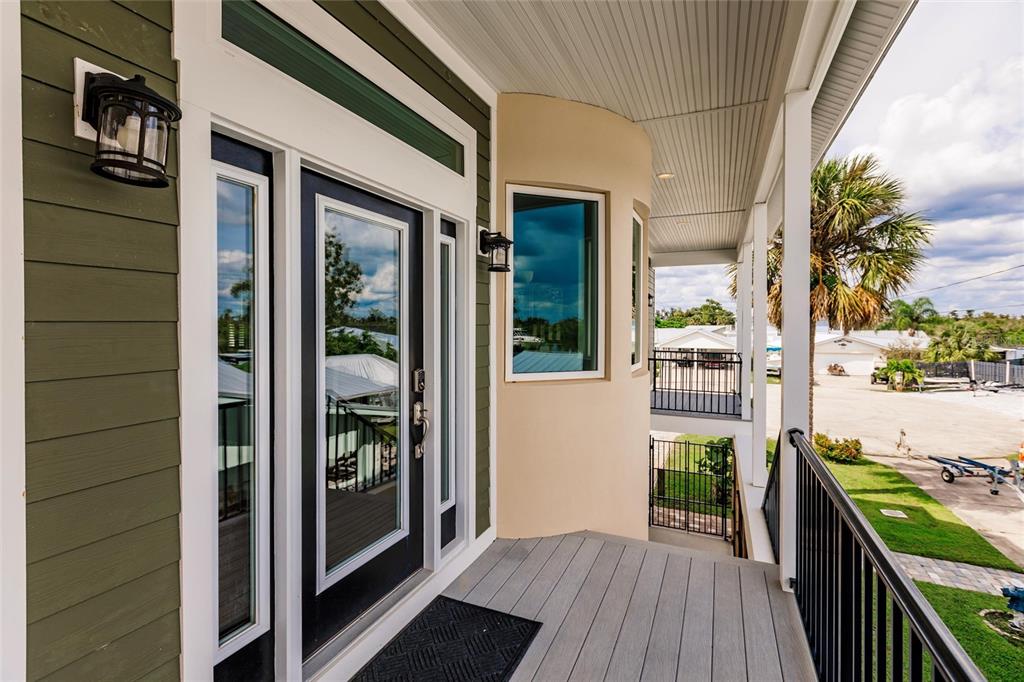 9691 Southwest Anchor Arcadia, FL 34269 - Photo 13 of 74 a view of a balcony with wooden floor and outdoor space