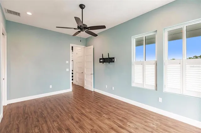 a view of a kitchen with a sink and a window