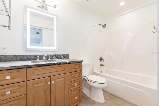 a picture of a bathroom with a sink