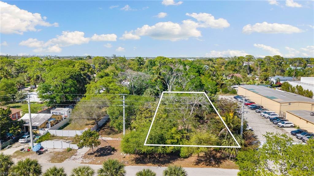 2995 Terrace Avenue Naples, FL 34104 - Photo 1 of 7 an aerial view of a residential houses with outdoor space