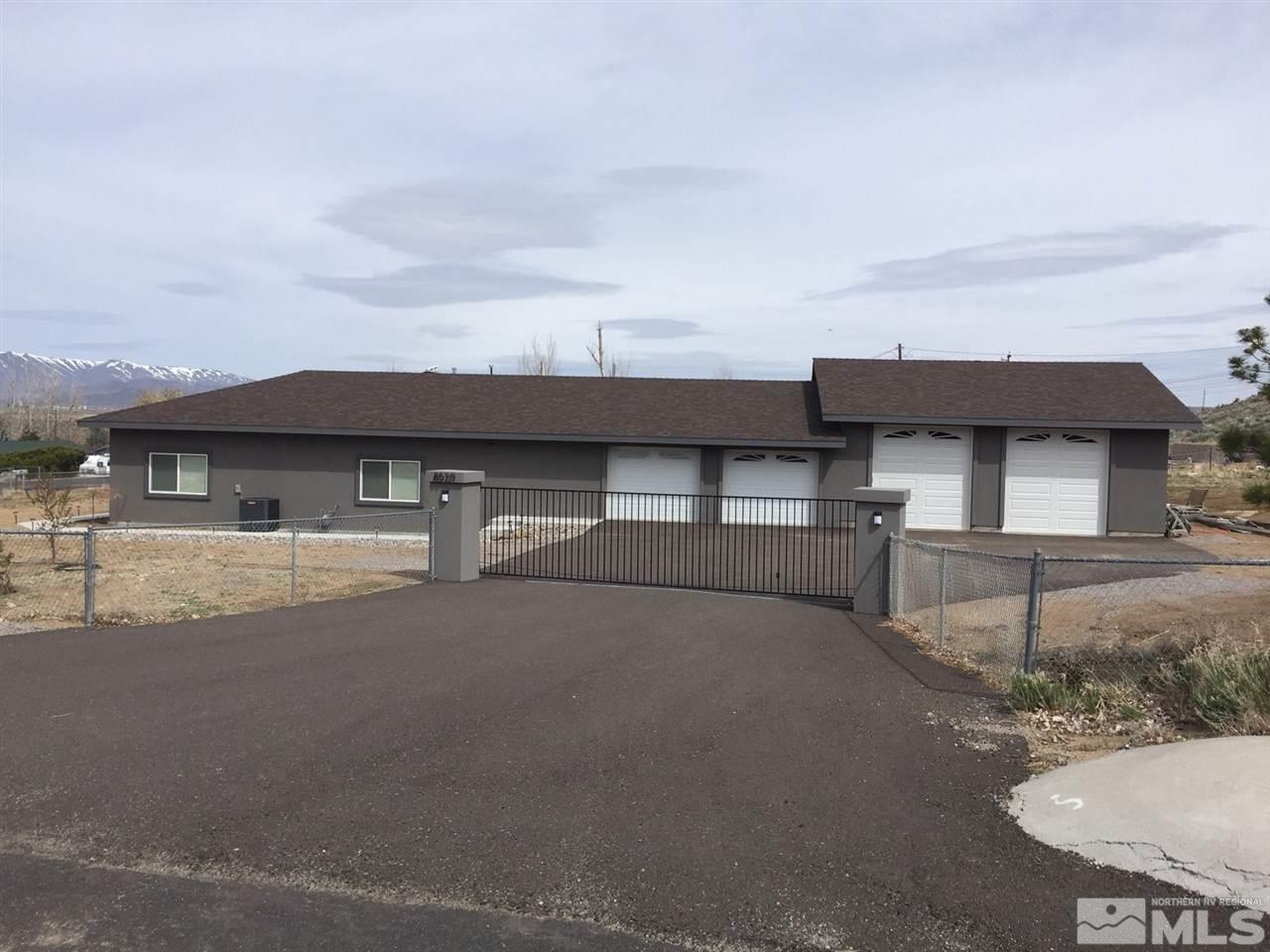 8520 Aquifer Way Reno, NV 89506 - Photo 1 of 1 front view of a house with a street