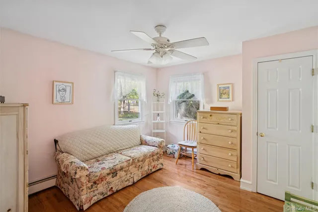 a living room with furniture and a window