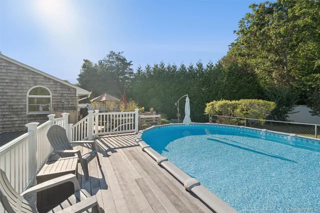 a view of balcony with furniture