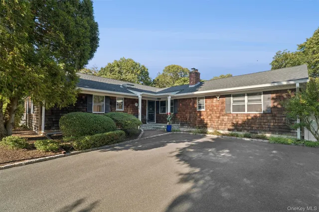 front view of a house with a street