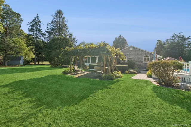 a garden view with a sitting space