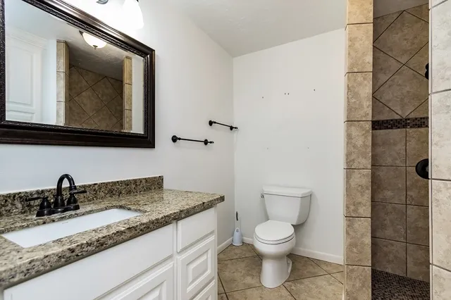 a view of a house with a big yard