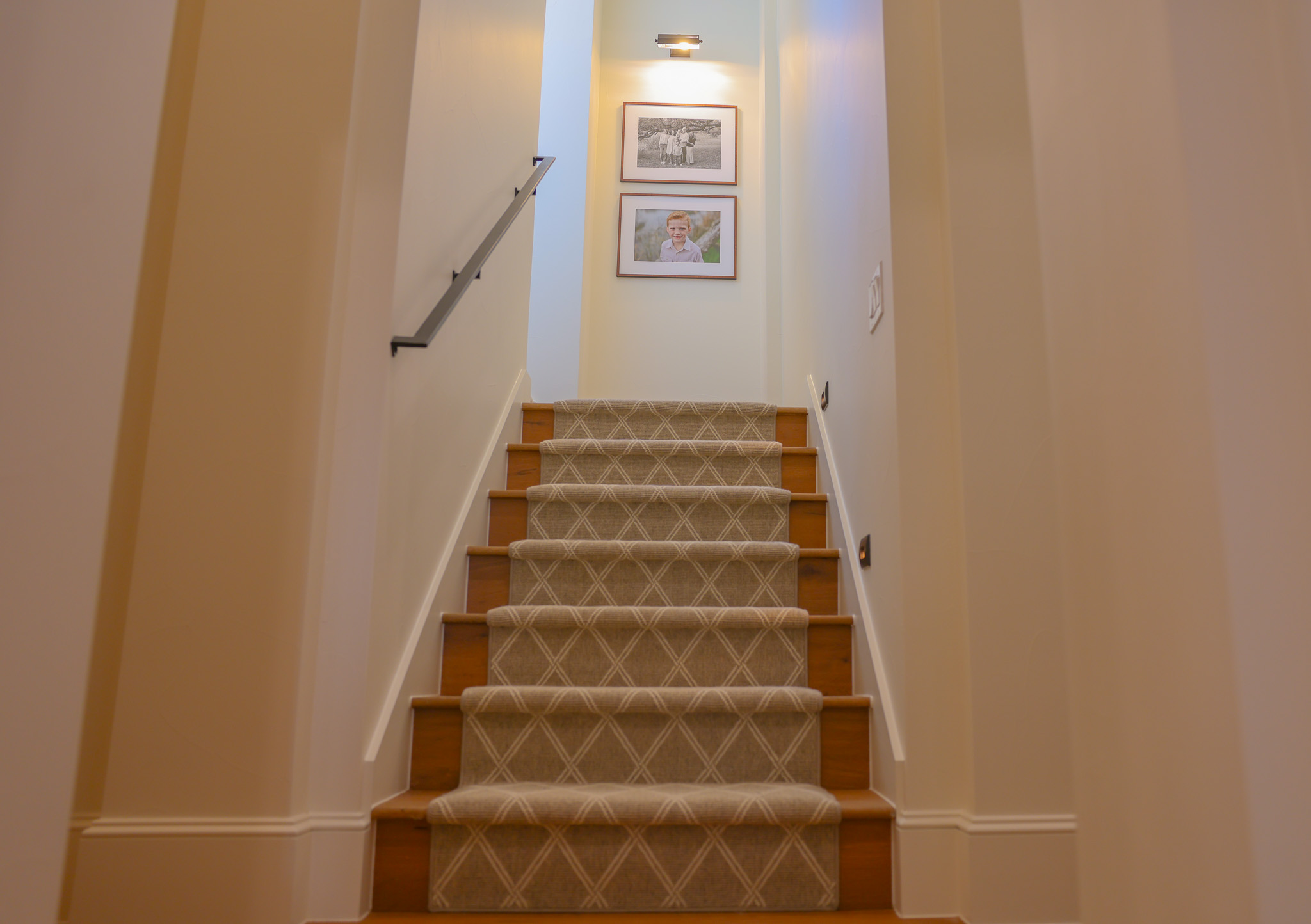 920 Ryan Road Bertram, TX 78605 - Photo 18 of 40 A patterned runner accents the wooden steps of this elegant transitional staircase.