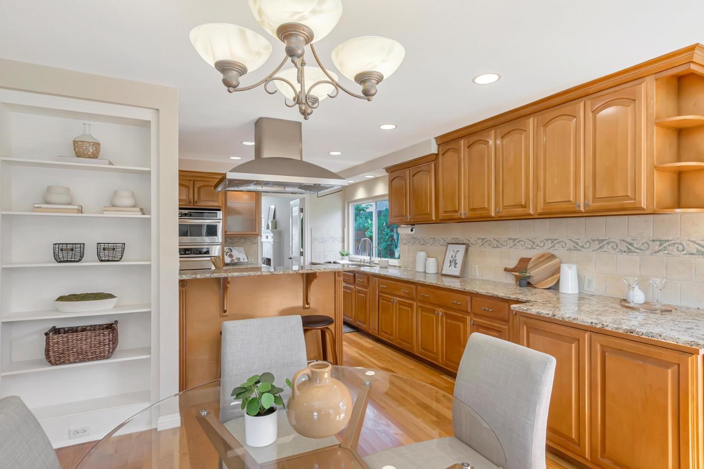 Utopia Place San Jose, CA 95127 - Photo 11 of 35 a kitchen with stainless steel appliances granite countertop a sink and cabinets