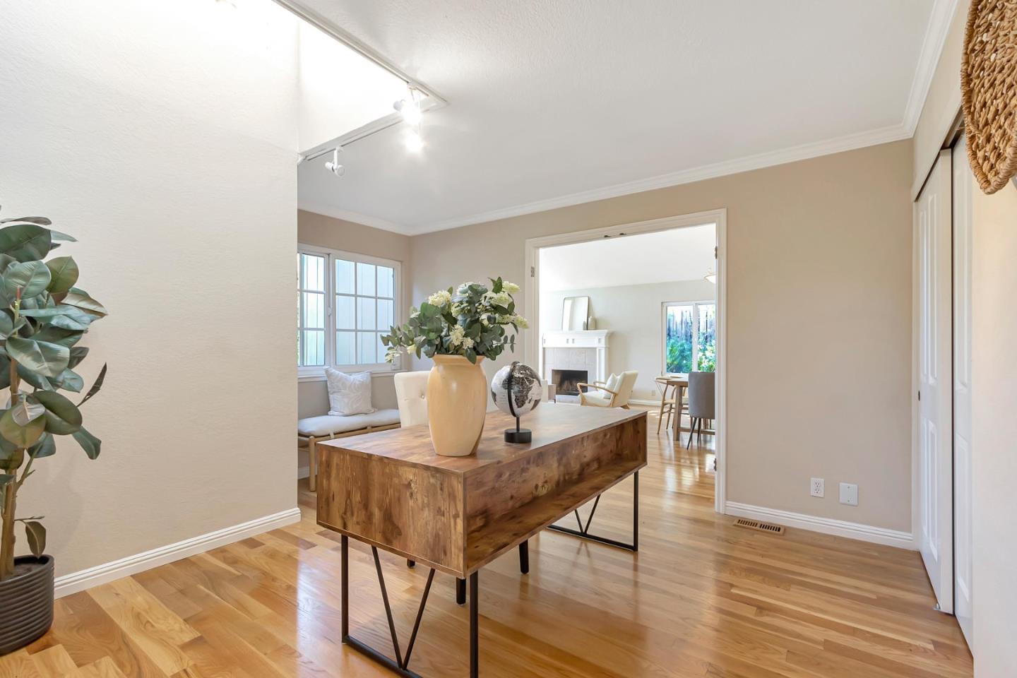 Utopia Place San Jose, CA 95127 - Photo 12 of 35 a dining room with furniture and wooden floor