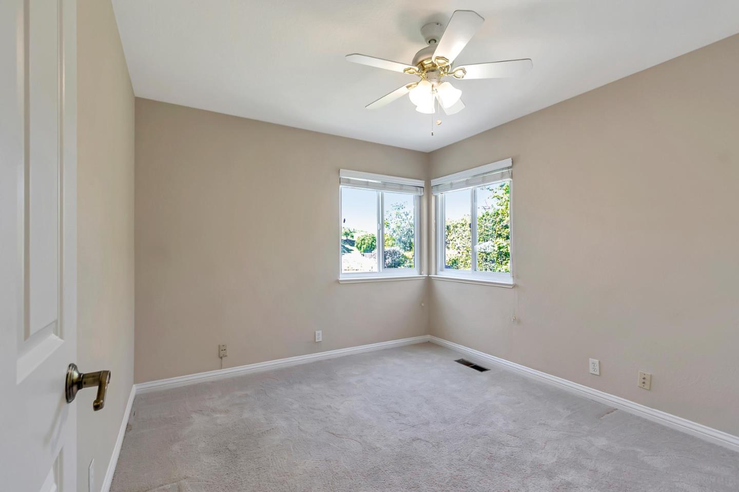 Utopia Place San Jose, CA 95127 - Photo 16 of 35 an empty room with windows and fan