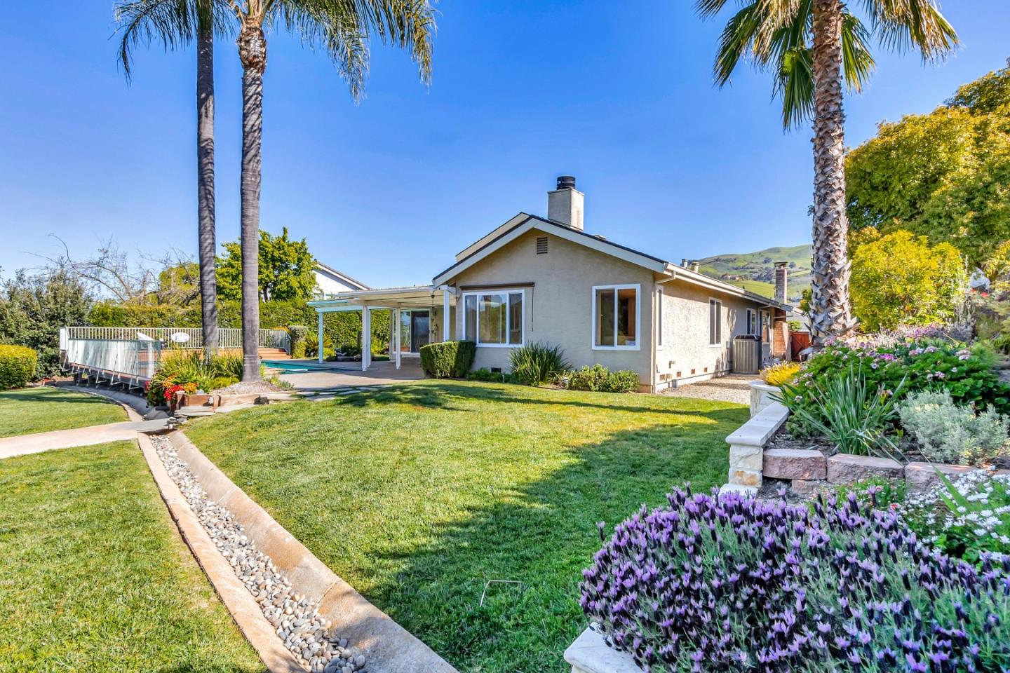 Utopia Place San Jose, CA 95127 - Photo 30 of 35 a view of a house with a swimming pool