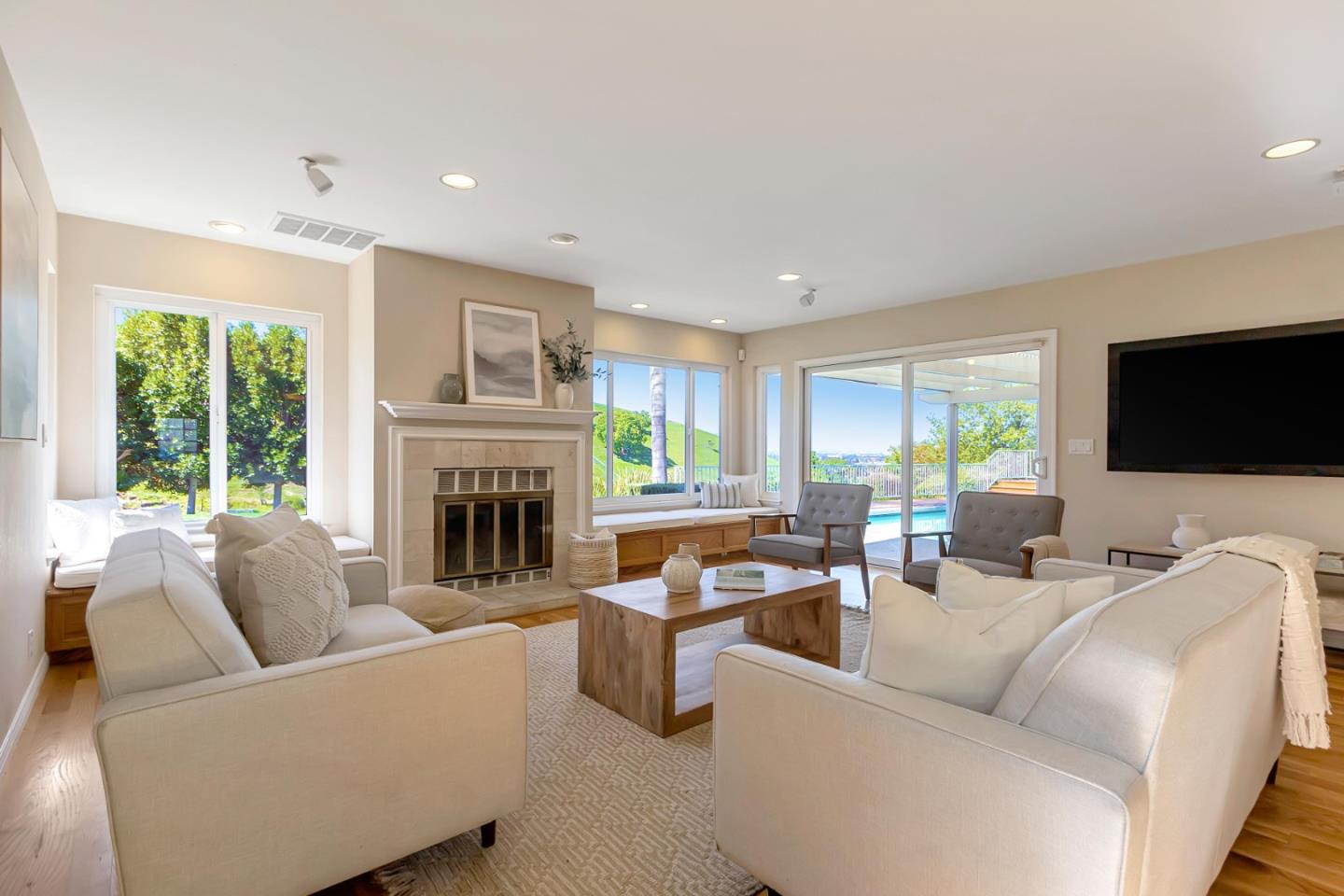 Utopia Place San Jose, CA 95127 - Photo 5 of 35 a living room with furniture fireplace and a flat screen tv
